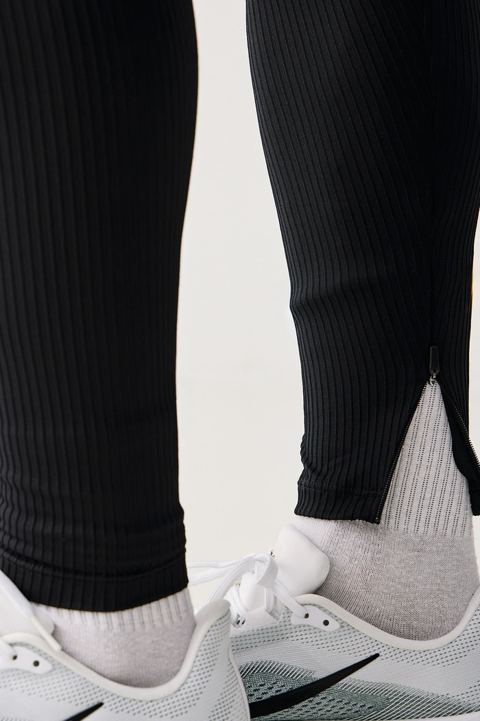 Legginsy sportowe męskie AeroSwift Dri-FIT ADV Nike czarny FN3367.010