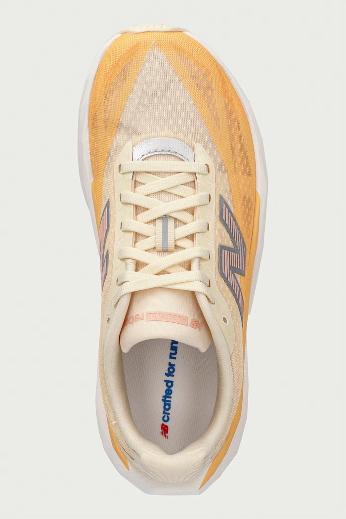 New Balance buty do biegania damskie FuelCell Rebel v5 pomarańczowy WFCX8KC