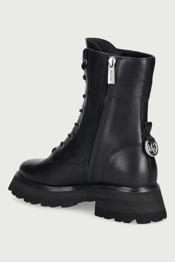 Scarpe MICHAEL Michael Kors Workers sulla banchina da donna in pelle Caleb Lug Bootie 40F6CBFE5L.001 nero