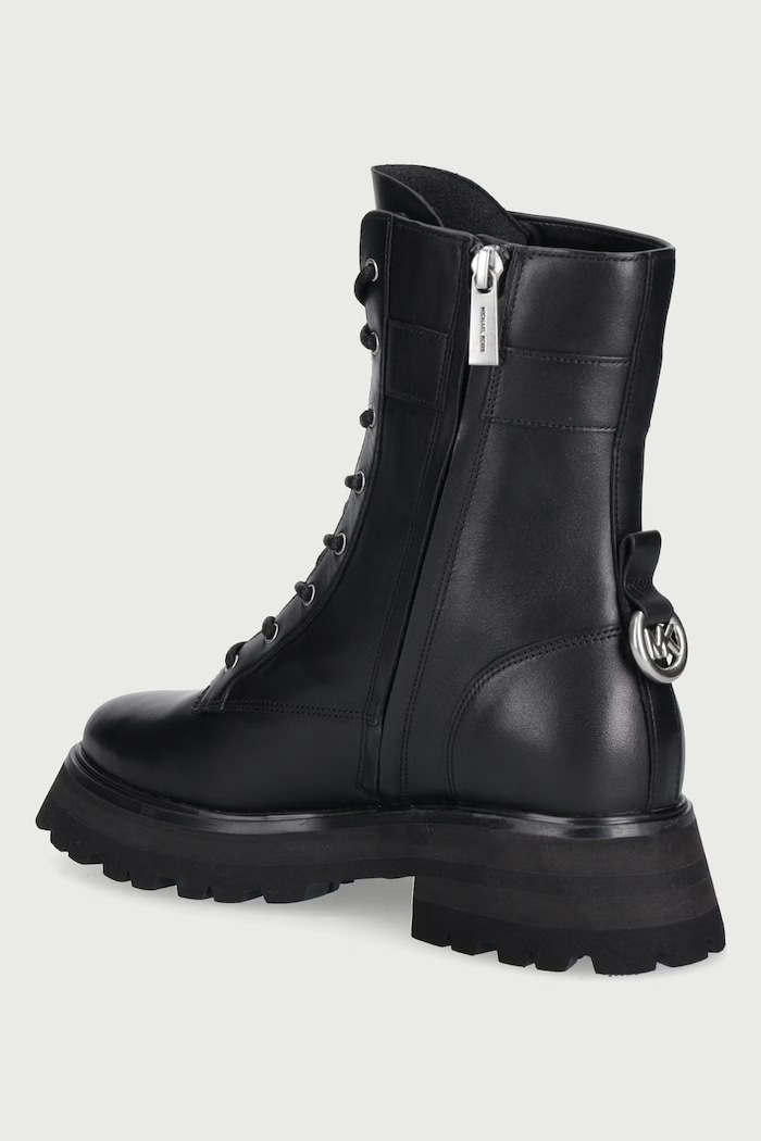 Scarpe MICHAEL Michael Kors Workers sulla banchina da donna in pelle Caleb Lug Bootie 40F6CBFE5L.001 nero