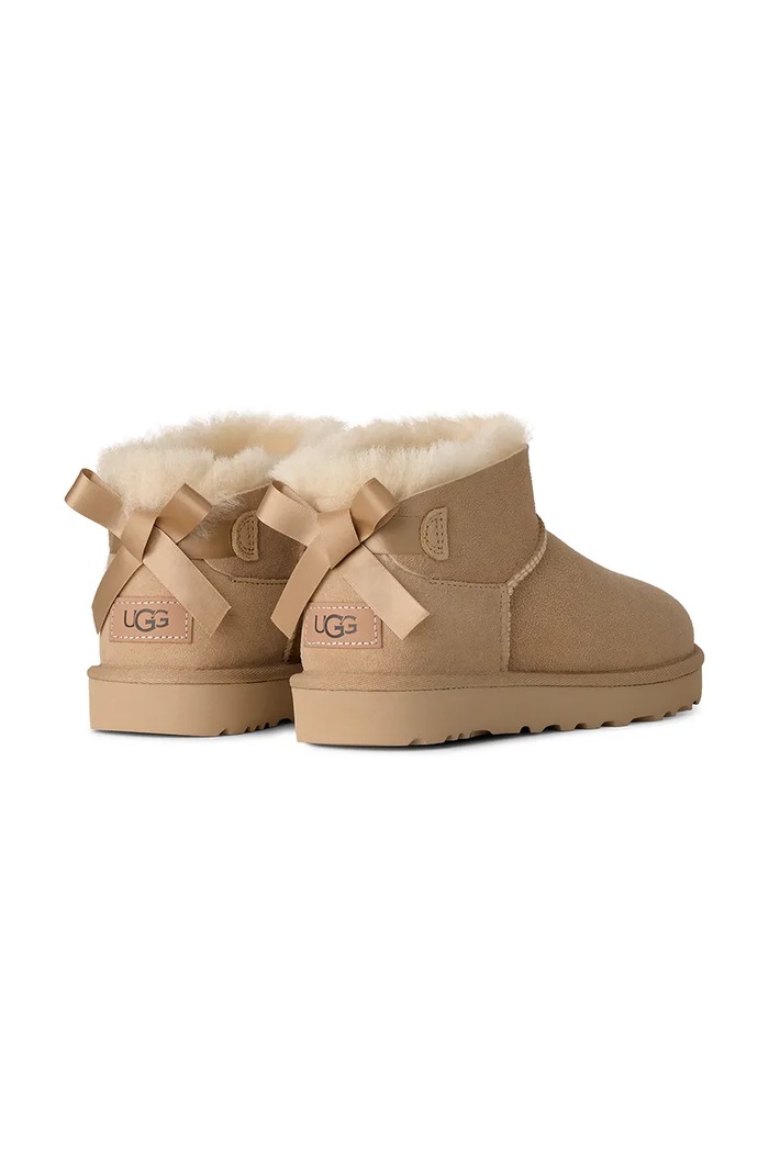 Παπούτσια UGG W Ultra Mini Bailey Bow μπότες χιονιού γυναικείες σουέτ 1185491.SAN μπεζ