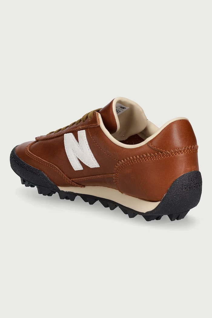 Obuwie New Balance Sneakersy męskie skórzane UGTRS2AN brązowy