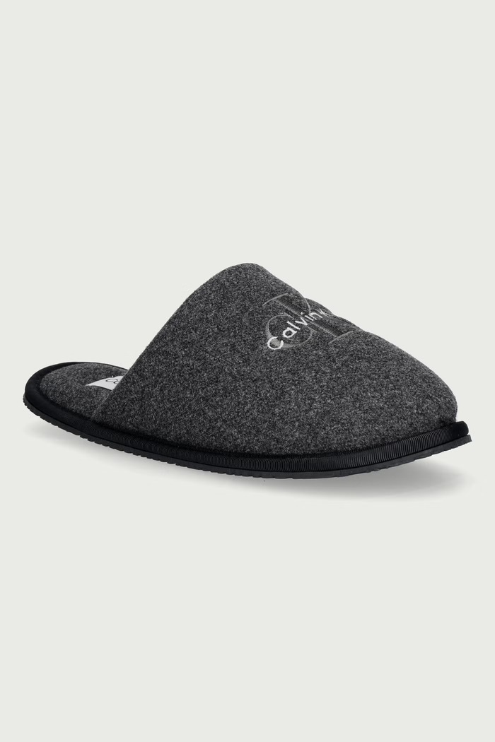 Calvin Klein Kapcie męskie HOTEL SLIPPER MONOLOGO FELT szary HM0HM022770GJ