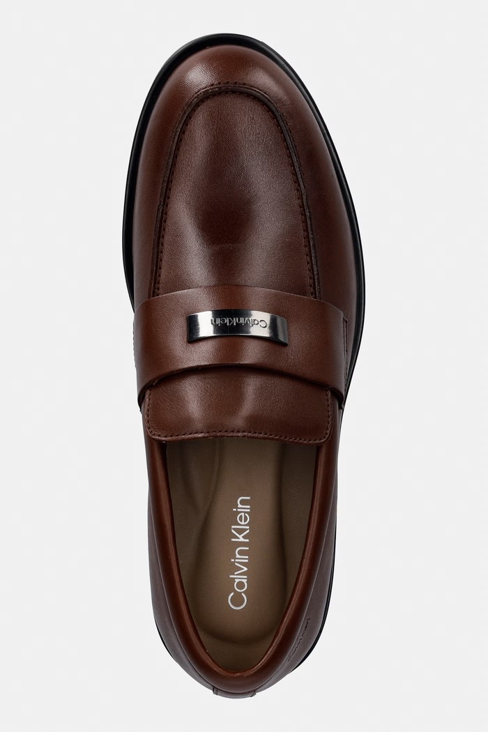 Calvin Klein mokasyny męskie skórzane ESS RUBBER LOAFER HW PLAQ VA LTH brązowy HM0HM02177.GYU