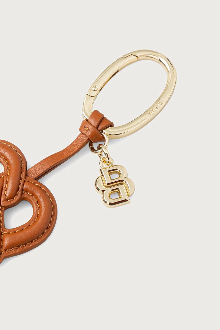 BOSS Brelok damski Bretzel Charm 50573403 brązowy AW26