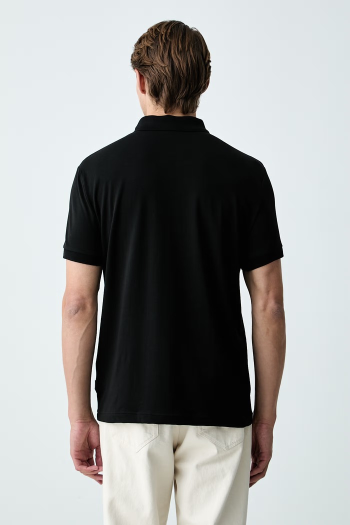 Одежда Armani Exchange поло для мужчин из хлопка с эластаном XM003422.AF26650 чёрный