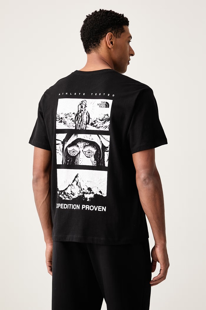 Ρούχα The North Face T-shirt ανδρικό βαμβακερό Relaxed NF0A8H6AJK31 μαύρο