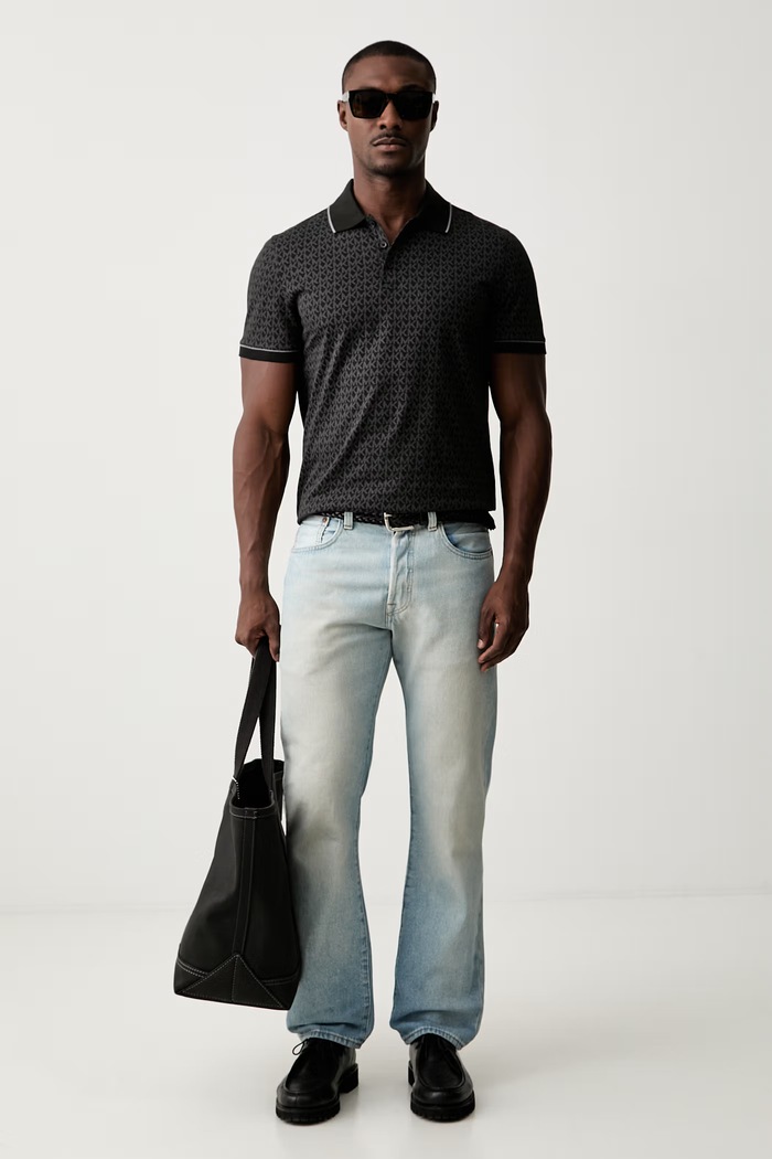 Michael Kors polo męskie z bawełną CS650V848T czarny AW26
