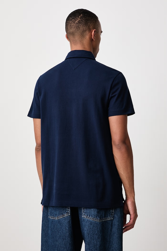Oblačila Tommy Hilfiger Polo majica moška bombažna MW0MW43265 mornarsko modra
