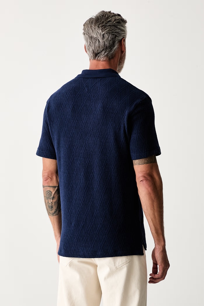 Odjeća Tommy Hilfiger pletena polo majica za muškarce s lyocellom MW0MW43279 mornarsko plava