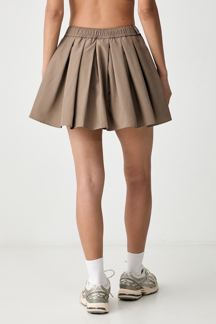 Odzież New Balance spódnica WB62T7K0ABQ brązowy