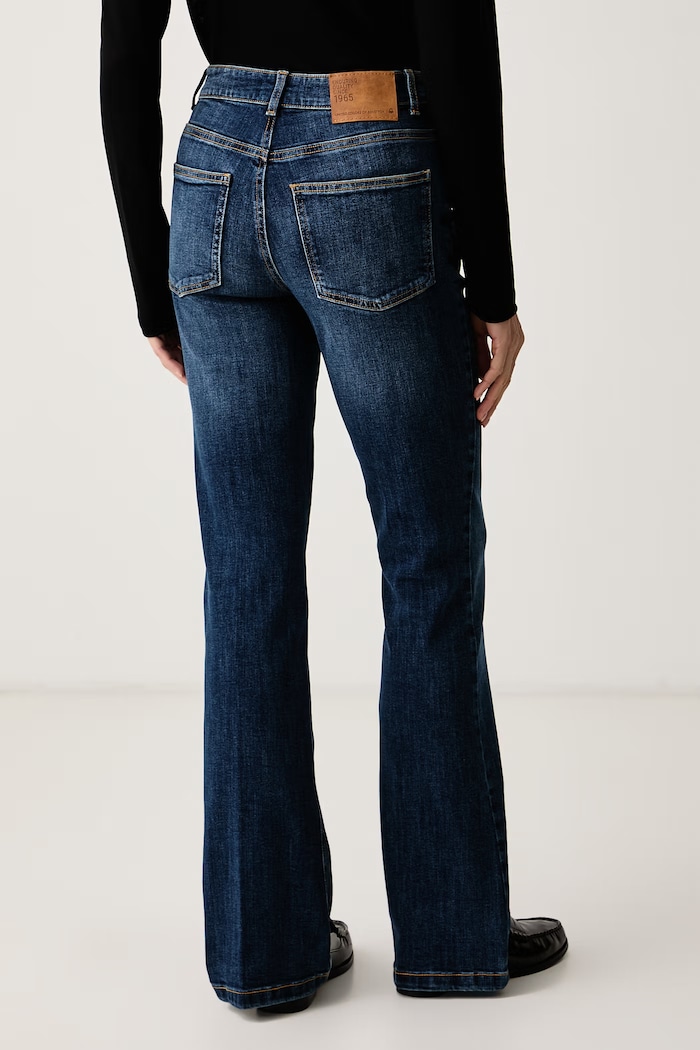 Odzież United Colors of Benetton Jeansy flare damskie 48CMDE035 niebieski