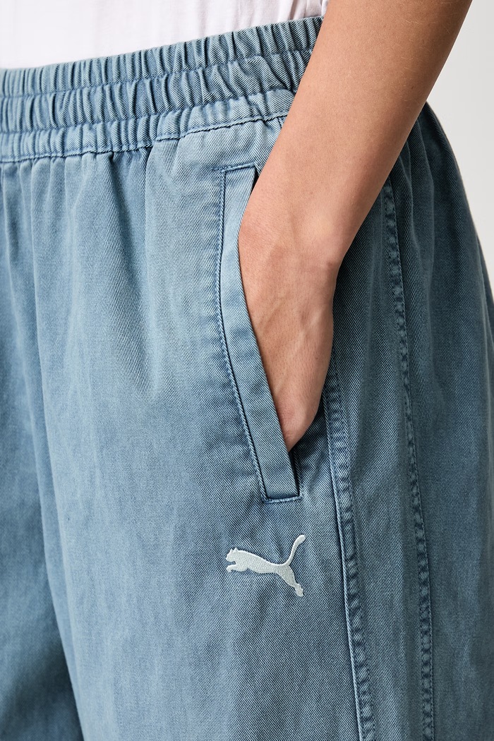 Puma jeansy relaxed fit damskie FUTURE PUMA ARCHIVE turkusowy 638361