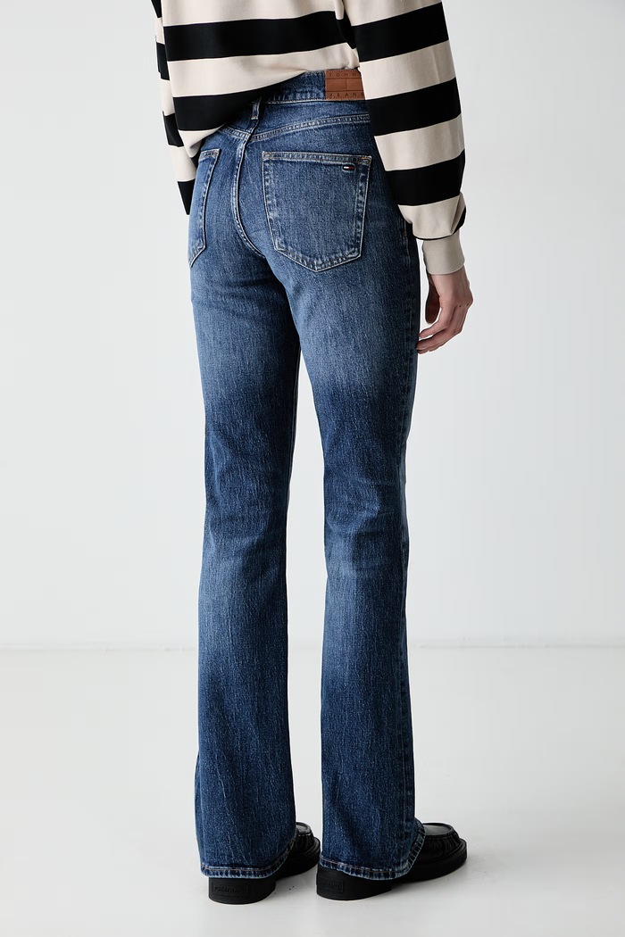 Oblačila Tommy Jeans flare kavbojke ženske DW0DW23077 mornarsko modra