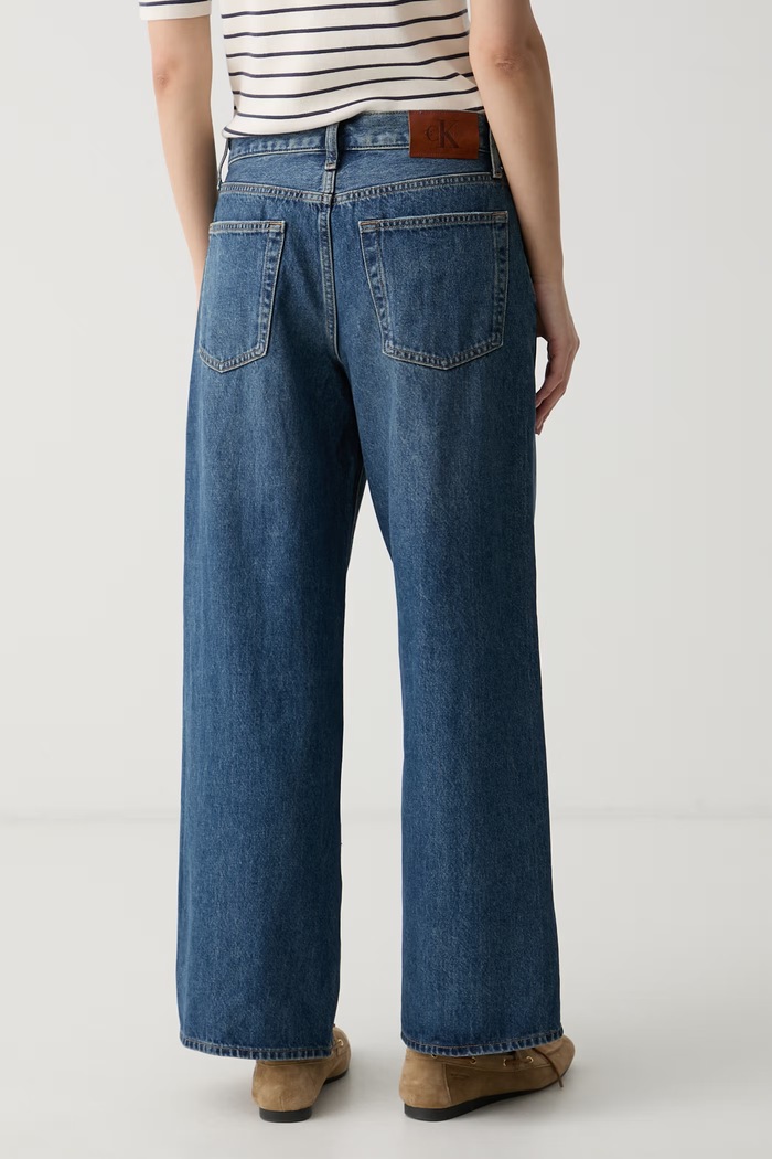 Oblačila Calvin Klein Jeans kavbojke s širokimi hlačnicami ženske LV047G914G modra