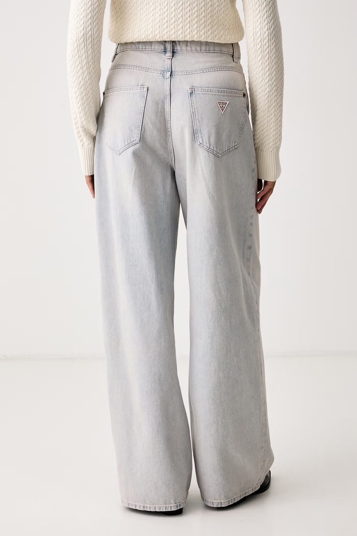 Odzież Guess Jeansy wide leg damskie GINA W6YAJP.D1762 niebieski