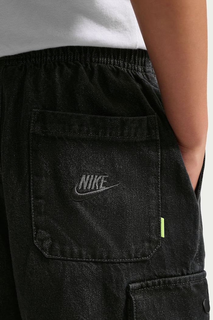 Jeansy relaxed fit dziecięce Nike Sportswear Nike IO0197 czarny