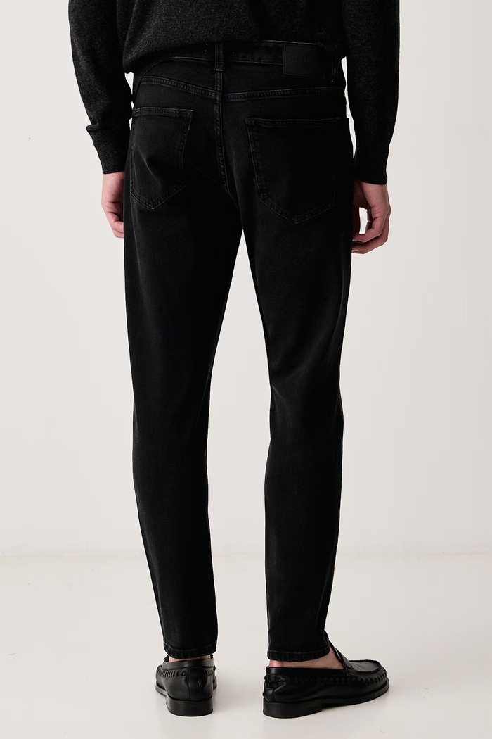 Odzież Marc O'Polo Jeansy slim taper męskie 5000009734 czarny