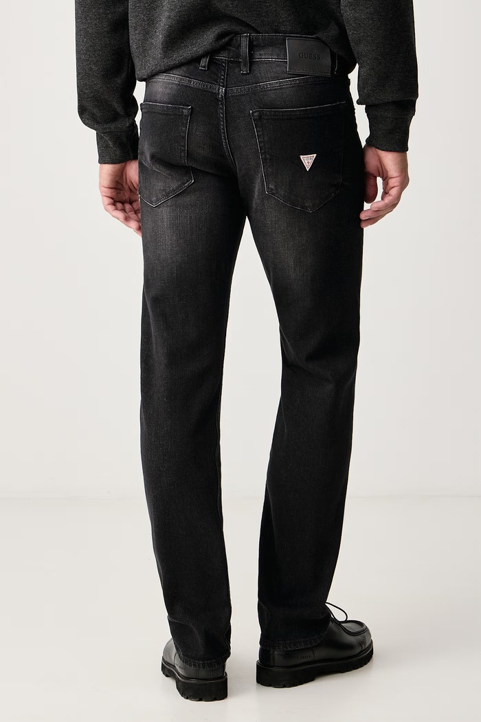 Odzież Guess Jeansy slim taper męskie FINNLEY M6BAS2.D2062 czarny