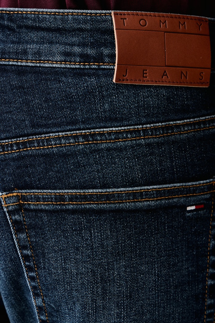 Rifle slim fit pánske Tommy Jeans DM0DM23479 tmavomodrá