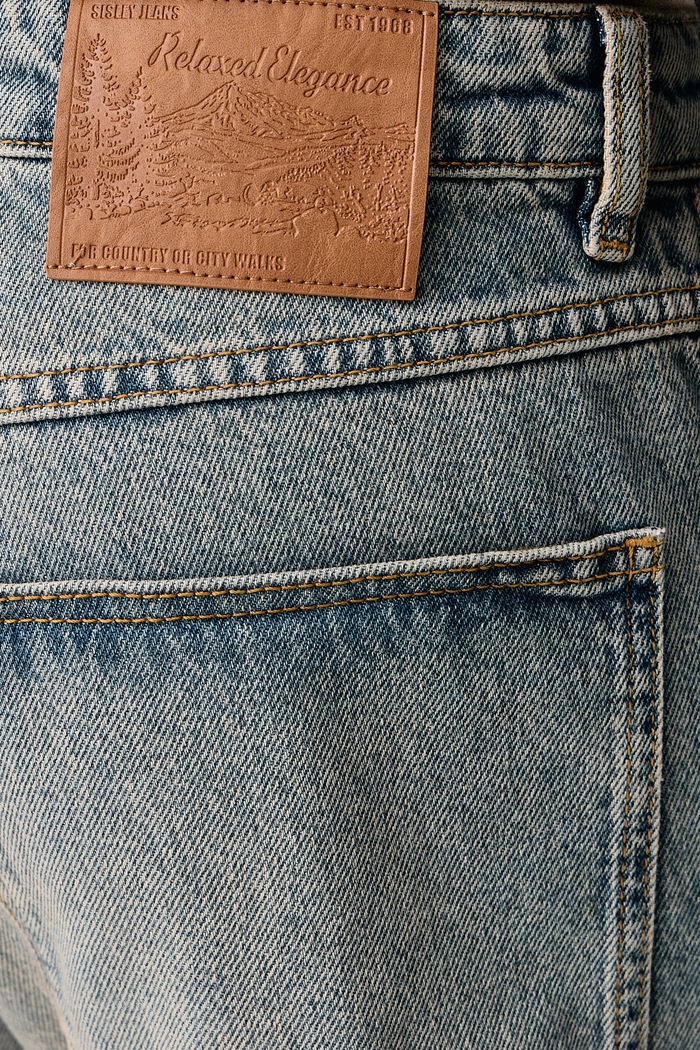 Jeansy relaxed fit męskie Sisley 4MBCSE035 niebieski