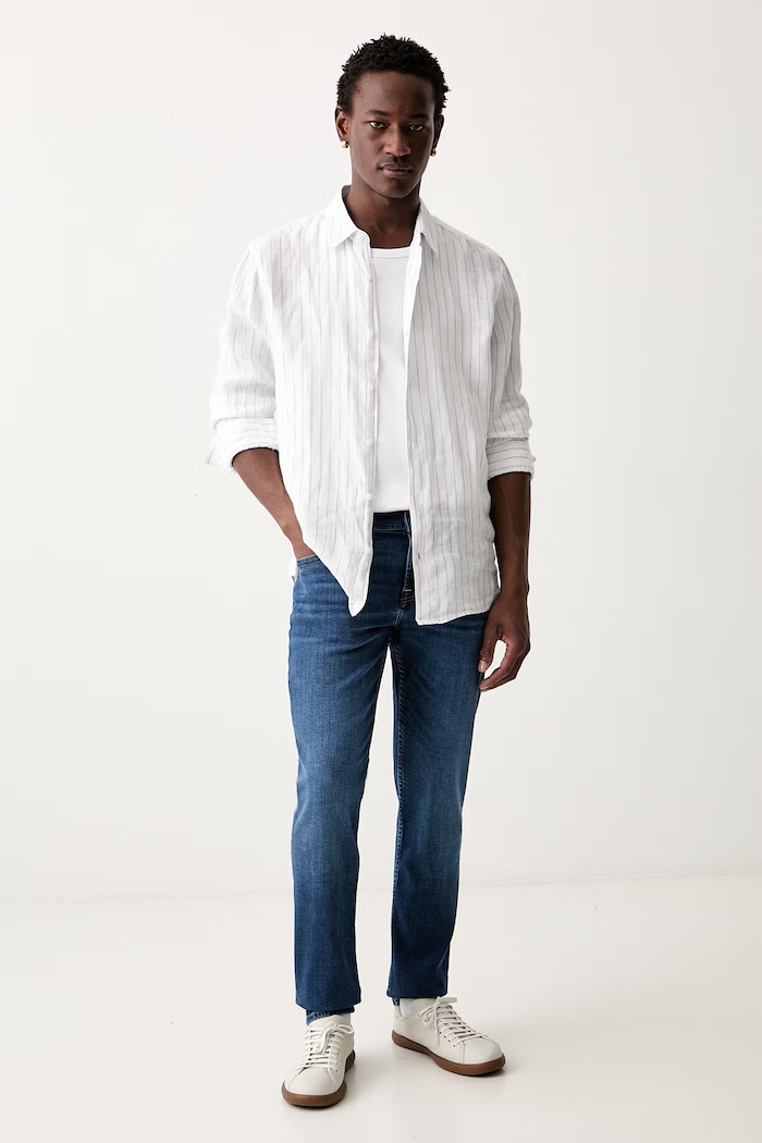 7 FOR ALL MANKIND jeansy slim taper męskie 7TB00C42 niebieski AW26
