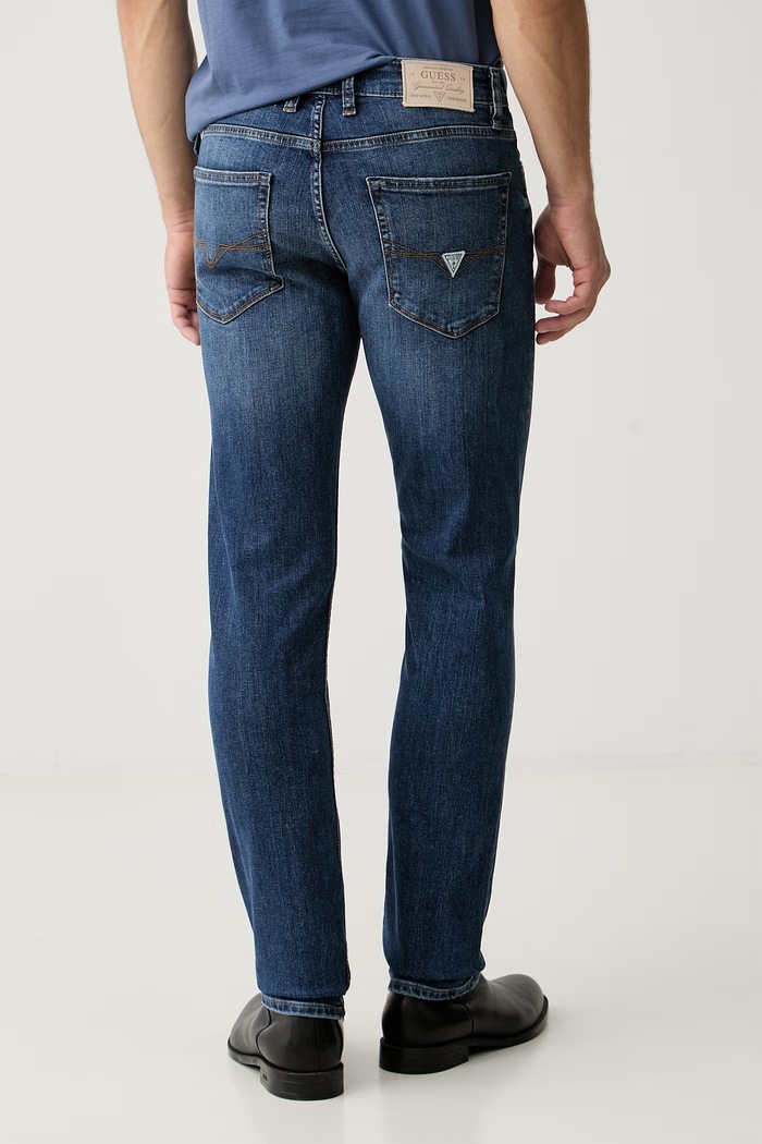 Oblačila Guess slim taper kavbojke moške FINNLEY M6YAS2.D1475 mornarsko modra