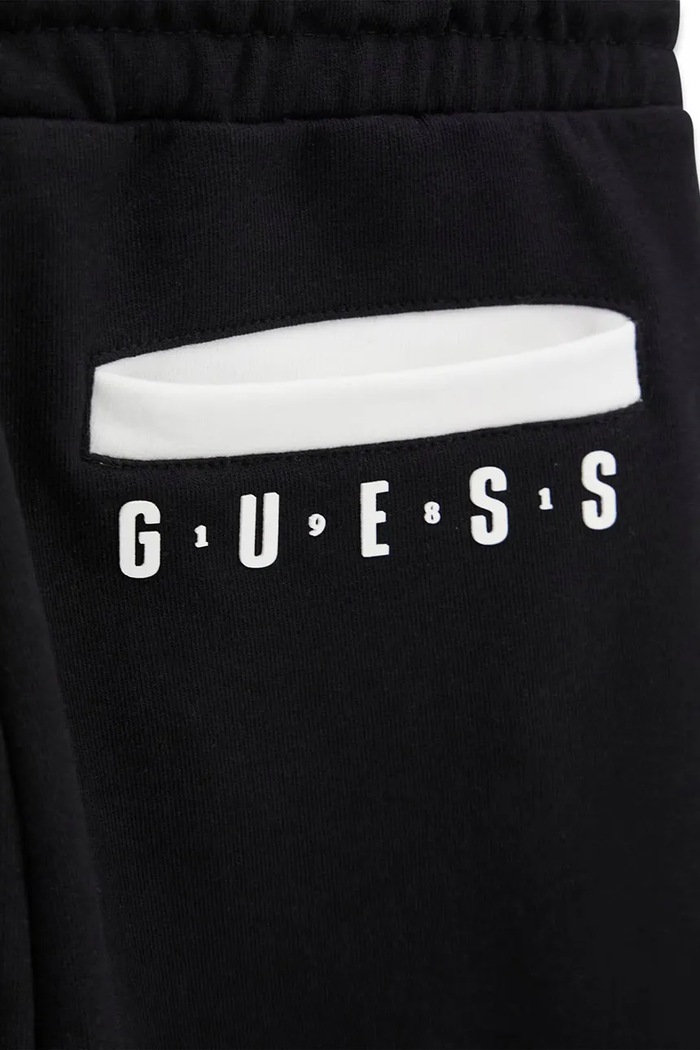 Chłopiec Guess Spodnie dresowe dziecięce bawełniane L6BB05.K6072.9BY2 czarny