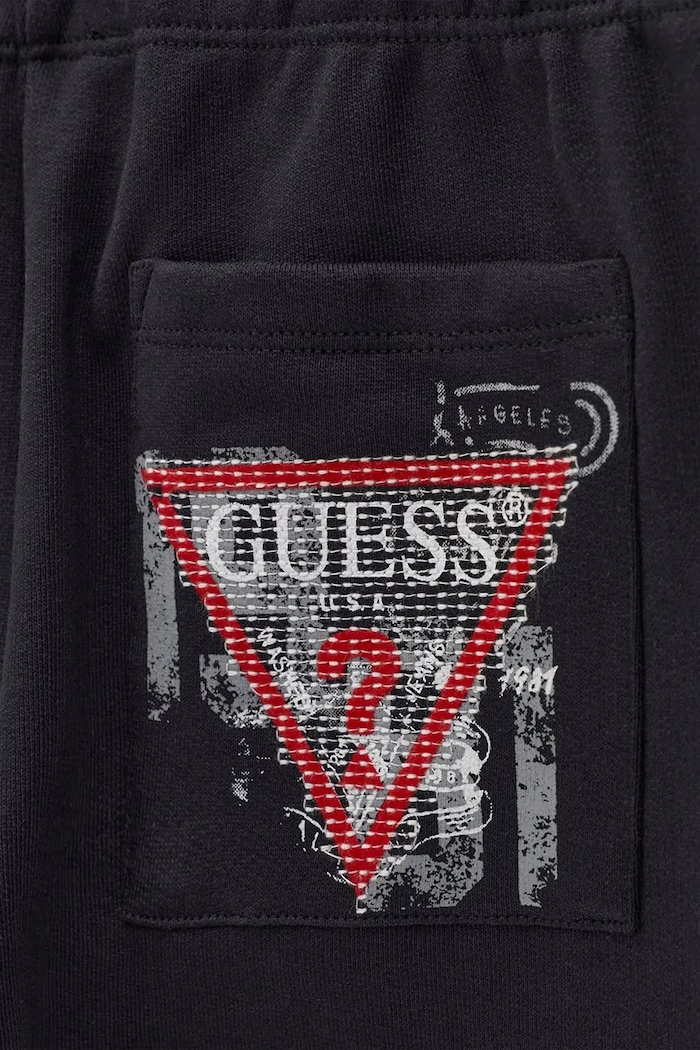 Spodnie dresowe dziecięce bawełniane Guess L6BB04.K6069.9BY2 czarny