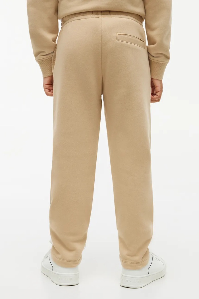 Spodnie dresowe dziecięce bawełniane Tommy Hilfiger KB0KB10772.9BY2 beżowy