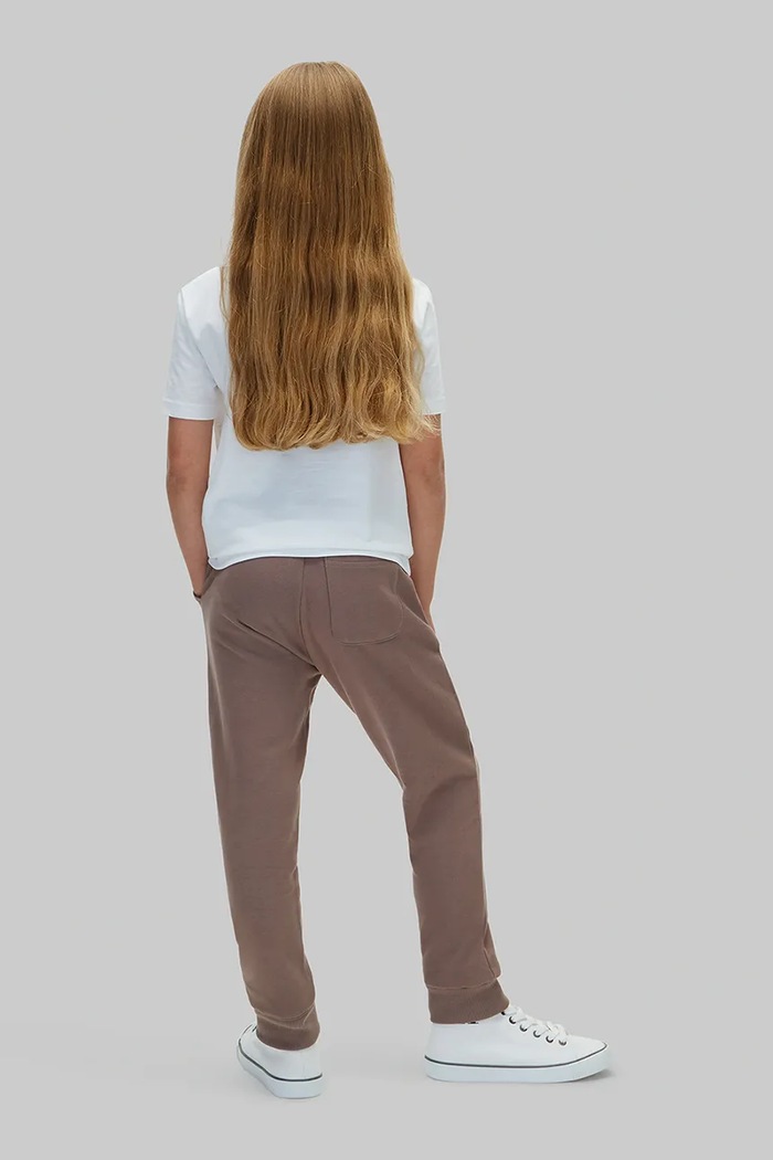 Spodnie dresowe dziecięce bawełniane Calvin Klein Jeans LVCKTJC08U.9BY2 brązowy