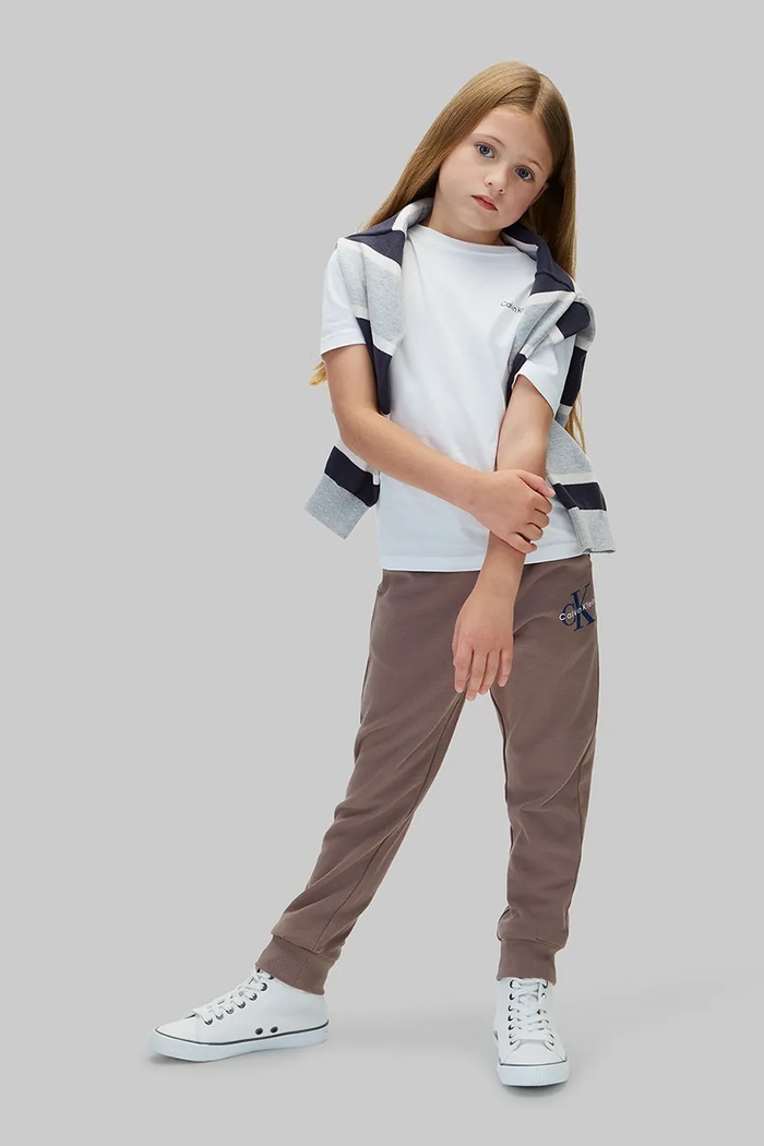 Spodnie dresowe dziecięce bawełniane Calvin Klein Jeans brązowy LVCKTJC08U.9BY2
