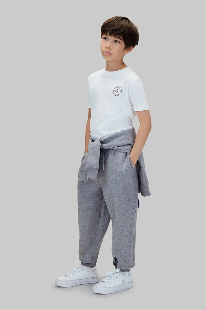 Spodnie dresowe dziecięce z bawełną Calvin Klein Jeans szary LVCKFJC29B.9BY2