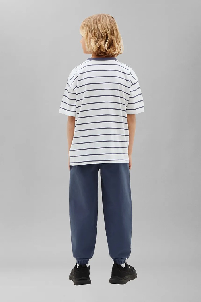 Chłopiec Calvin Klein Jeans Spodnie dresowe dziecięce bawełniane z elastanem LVCKTJC14B.9BY2 niebieski