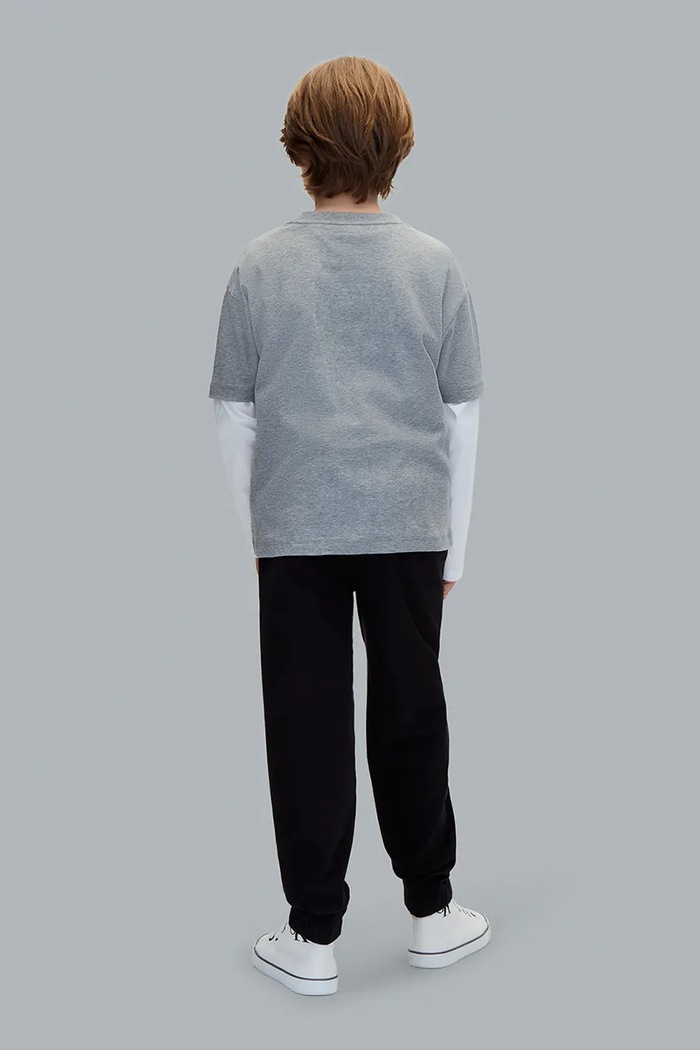 Calvin Klein Jeans spodnie dresowe dziecięce bawełniane z elastanem czarny LVCKTJC14B.9BY2