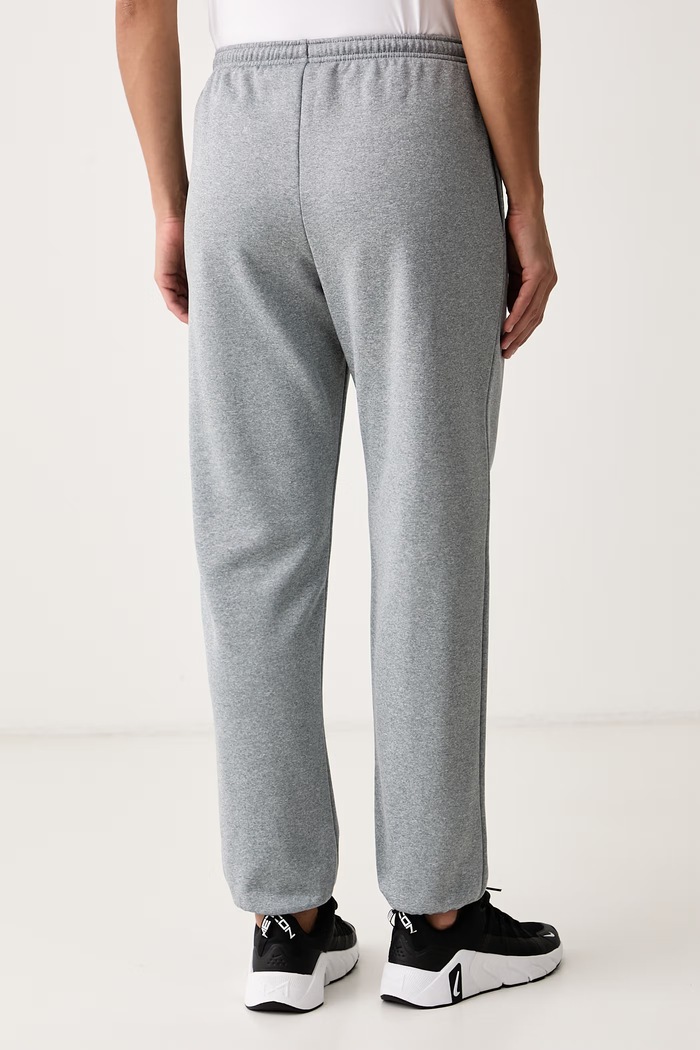 Odzież Nike Spodnie dresowe damskie Studio Fleece Therma-FIT IO0437.084 szary