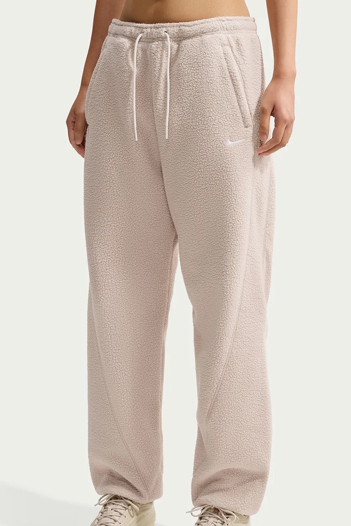 Spodnie dresowe dziecięce polarowe Nike Sportswear IU5217.236 beżowy