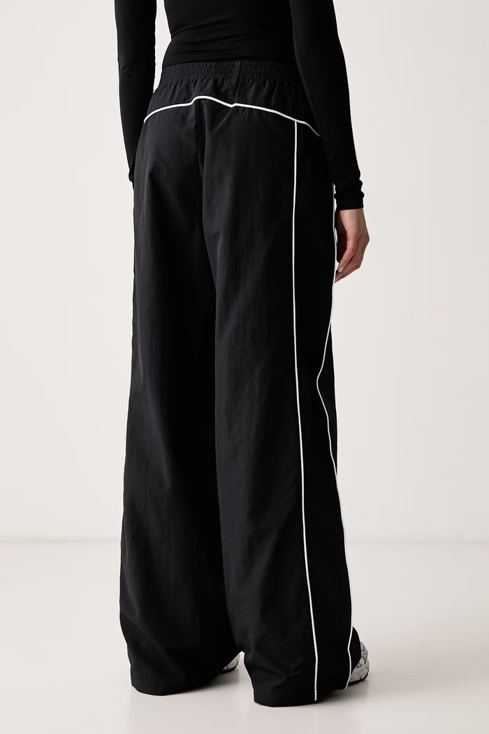 Odzież Le Privé Spodnie damskie VARSITY TROUSERS LP00898 czarny