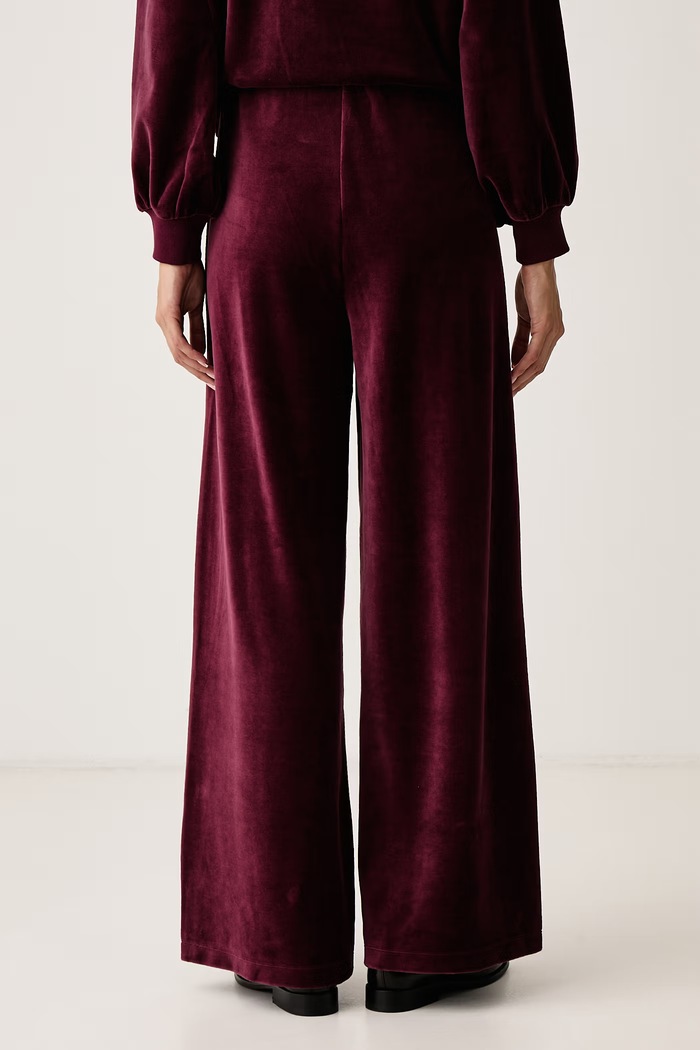 Odzież DKNY Spodnie dresowe damskie welurowe DJ6P3184 bordowy
