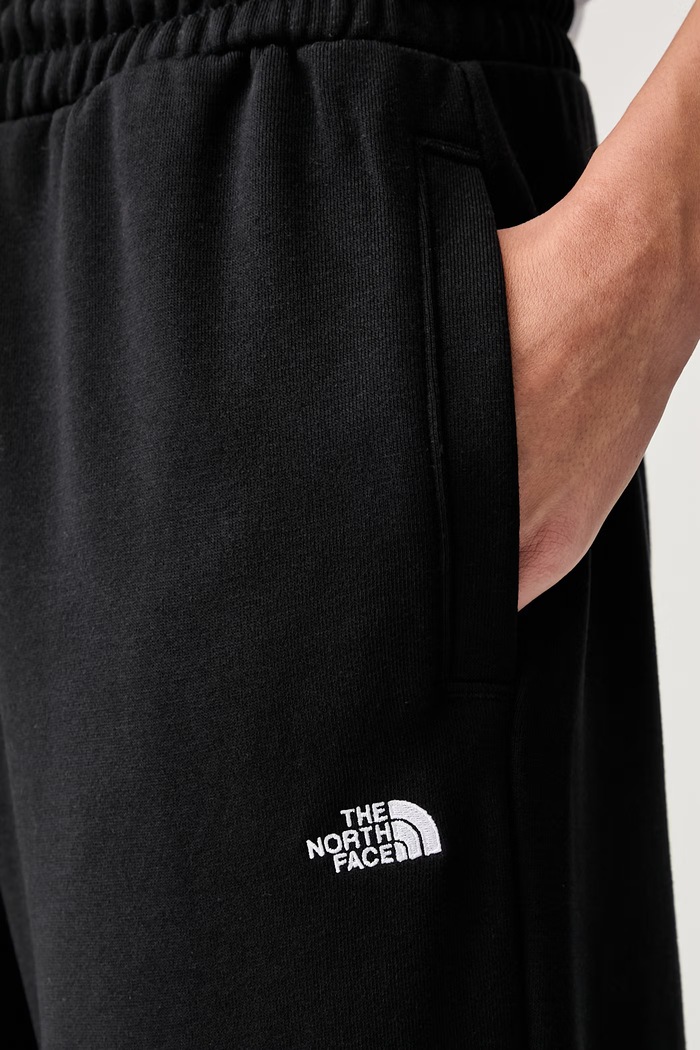 The North Face spodnie dresowe damskie z bawełną Essential czarny NF0A8FDSJK31