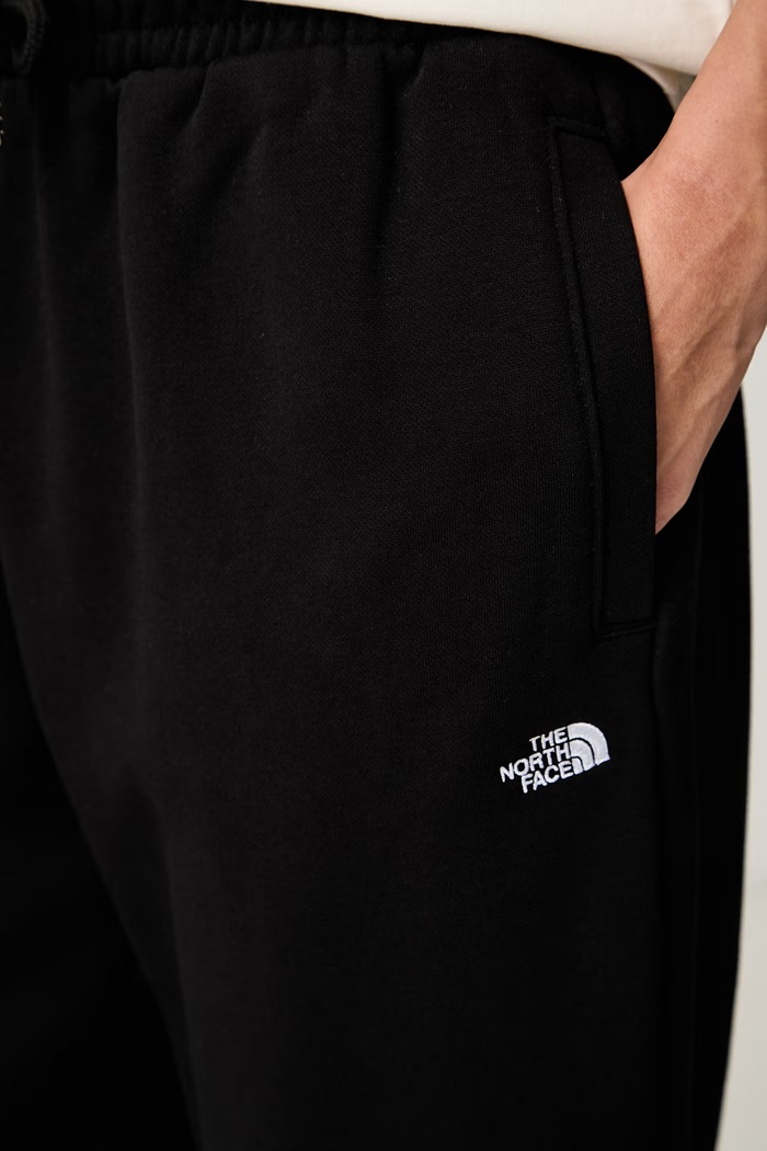 The North Face spodnie dresowe damskie z bawełną Essential czarny NF0A8CWDJK31