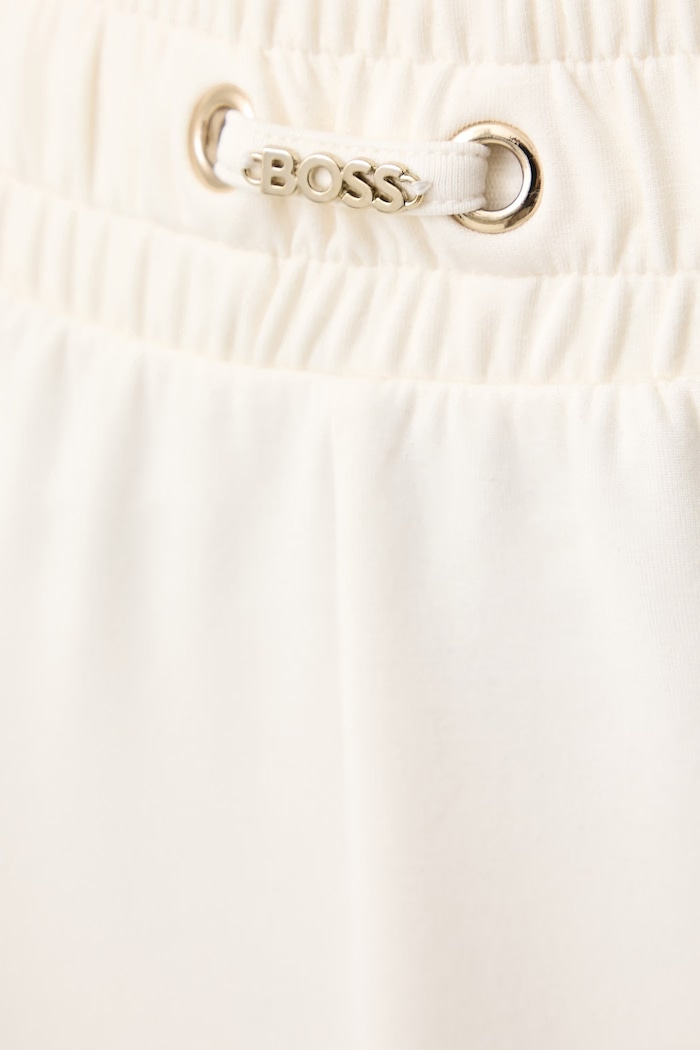 Spodnie dresowe damskie z modalem Mirage_Pants Tapered BOSS beżowy 50571041