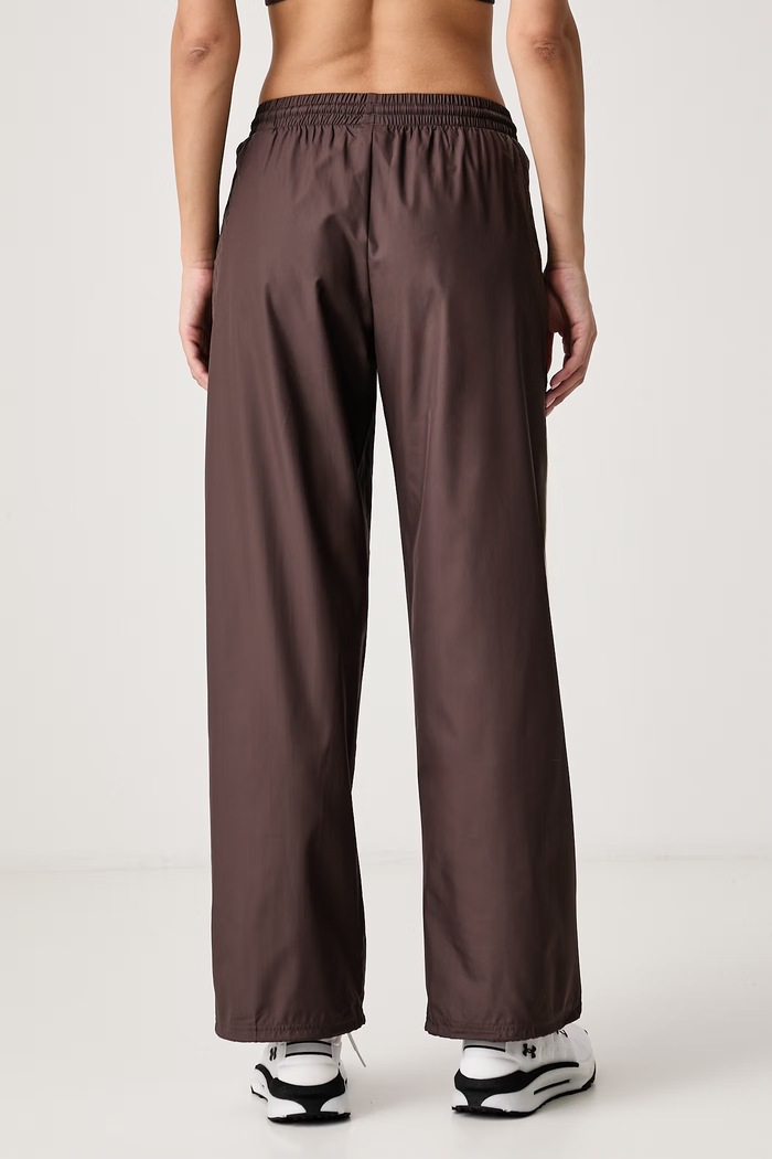 Odzież Under Armour Spodnie dresowe damskie Icon 6013532 brązowy