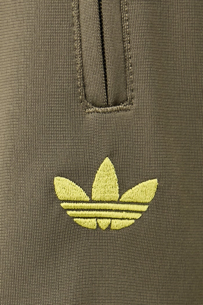 Spodnie dresowe damskie Firebird adidas Originals zielony KS4664