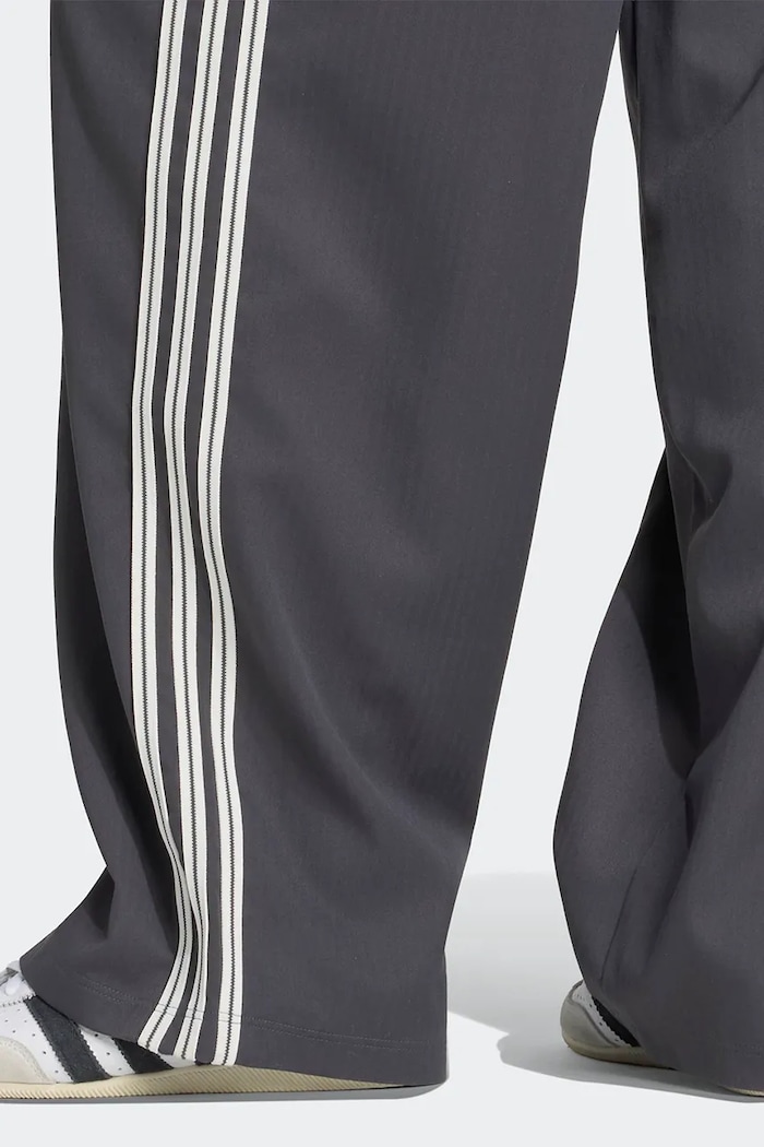 Teplákové nohavice dámske Firebird adidas Originals sivá KR9105