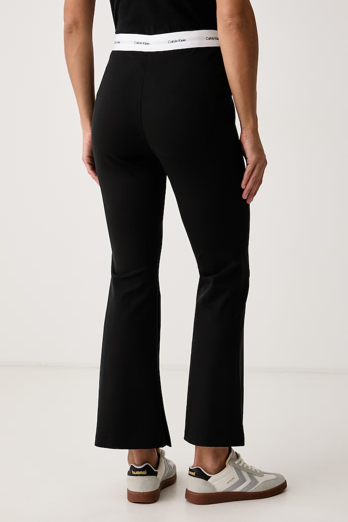 Oblečenie Calvin Klein Jeans Zvonové nohavice dámske LV047H640G čierna