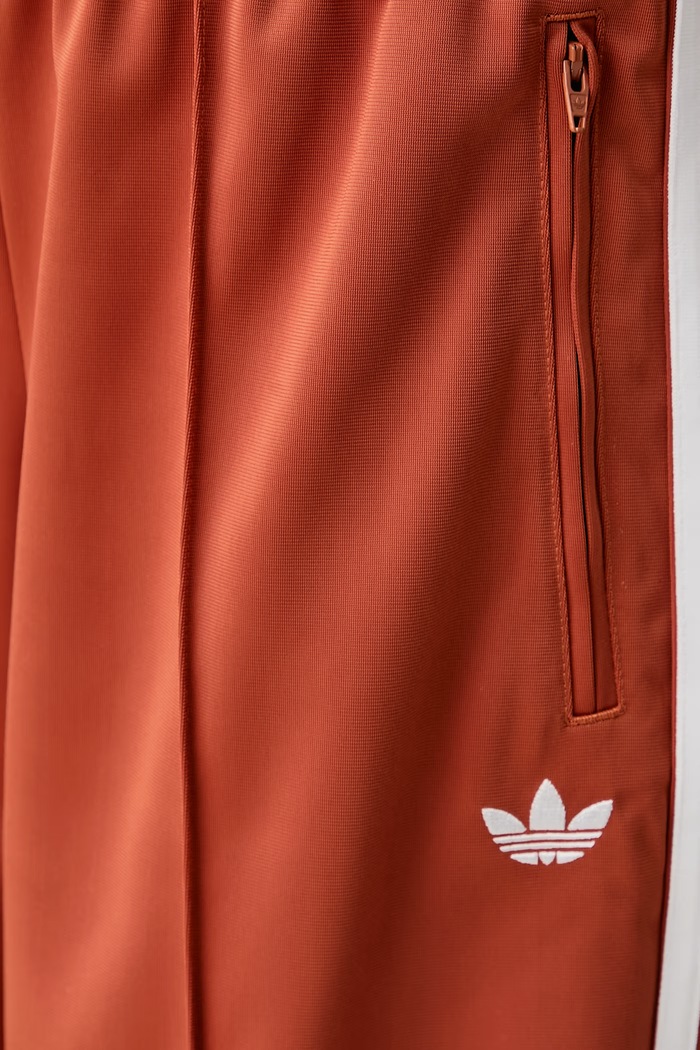 Spodnie dresowe damskie Firebird Barrel adidas Originals pomarańczowy LF1062
