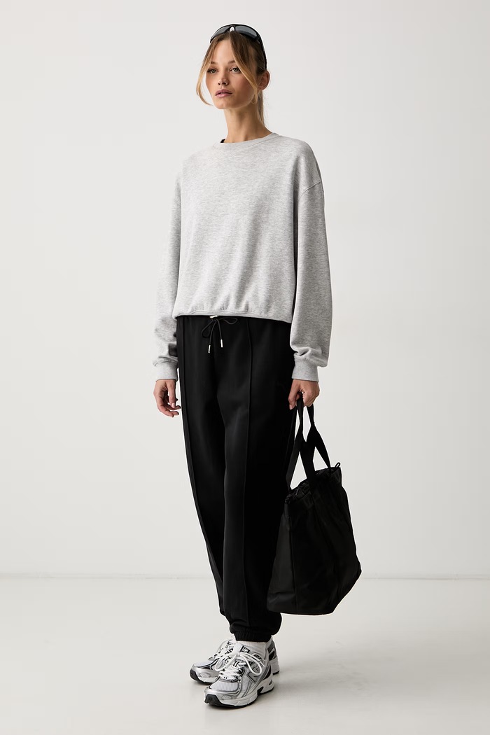 Puma teplákové nohavice dámske s bavlnou HER 694032 čierna AW26