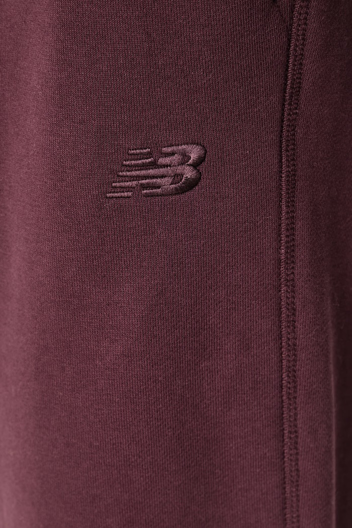 Spodnie dresowe damskie bawełniane New Balance WP41513YLR bordowy