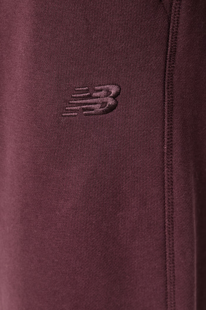 Spodnie dresowe damskie bawełniane New Balance WP41513YLR bordowy